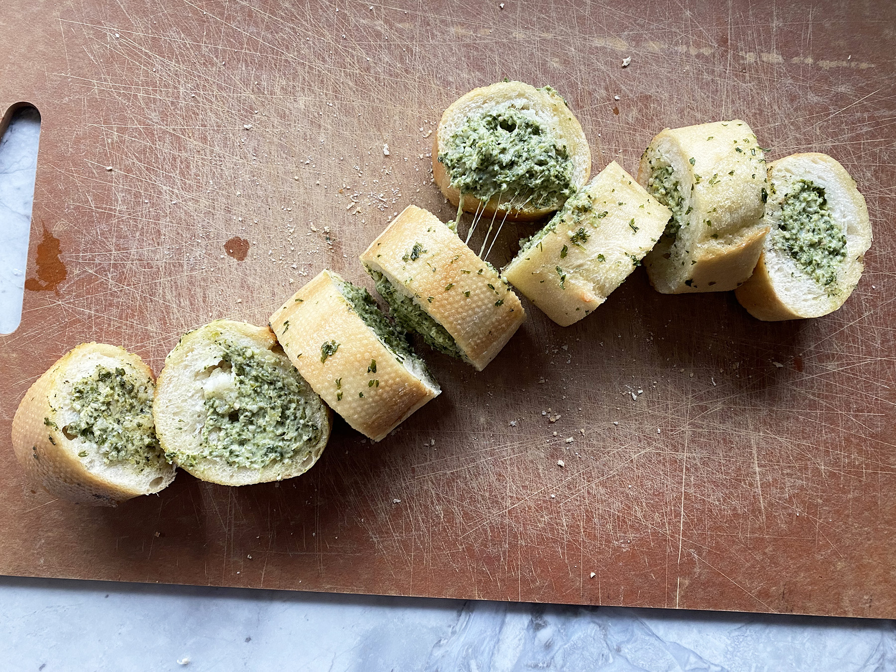 Spinach and Artichoke Stuffed Garlic Bread